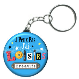 Porte-clés badge J'peux pas j'ai Loisirs créatifs-Réf PC1053