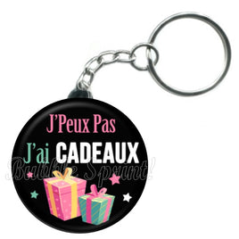 Porte-clés badge J'peux pas j'ai Cadeaux -Réf PC1082