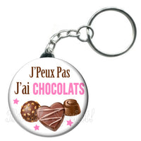 Porte-clés badge J'peux pas j'ai Chocolats -Réf PC1093