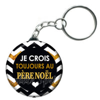 Porte-clés badge Je crois toujours au père noël -Réf PC1098