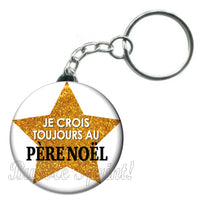 Porte-clés badge Je crois toujours au père noël -Réf PC1100