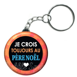 Porte-clés badge Je crois toujours au père noël -Réf PC1101