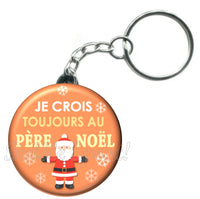 Porte-clés badge Je crois toujours au père noël -Réf PC1104