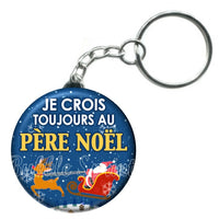 Porte-clés badge Je crois toujours au père noël -Réf PC1105