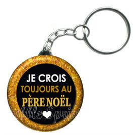 Porte-clés badge Je crois toujours au père noël -Réf PC1109