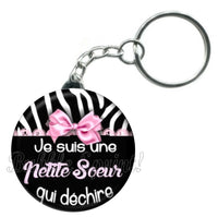 Porte-clés badge Petite soeur qui déchire -Réf PC835